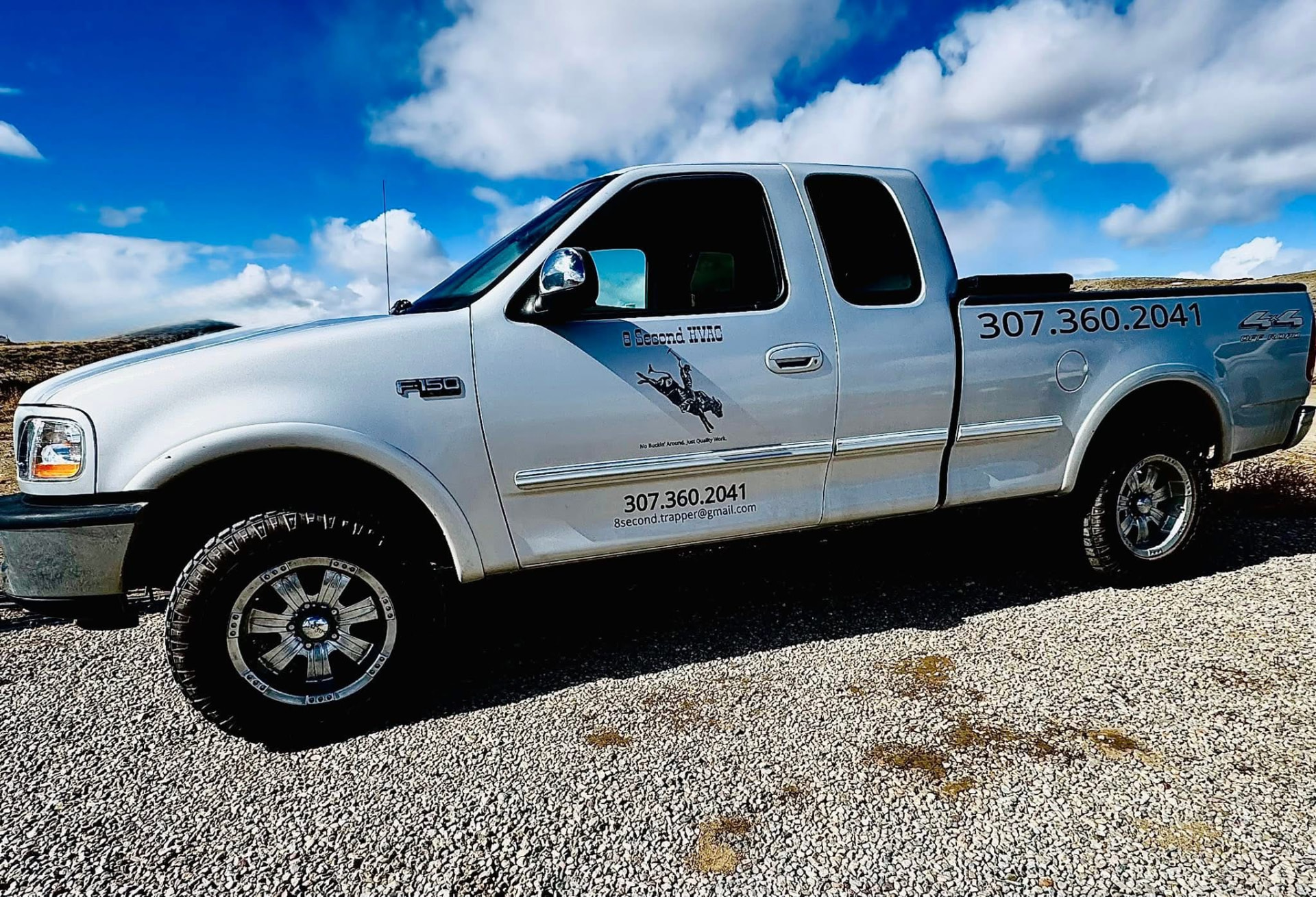 8 Second HVAC service truck with company lettering and phone number